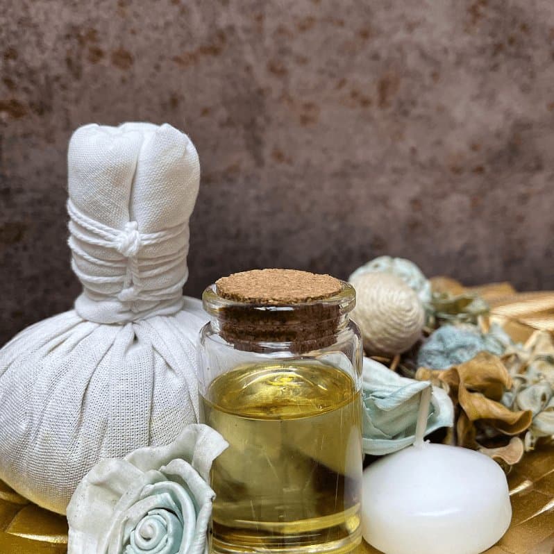 Thai herbal compress, oil and stones